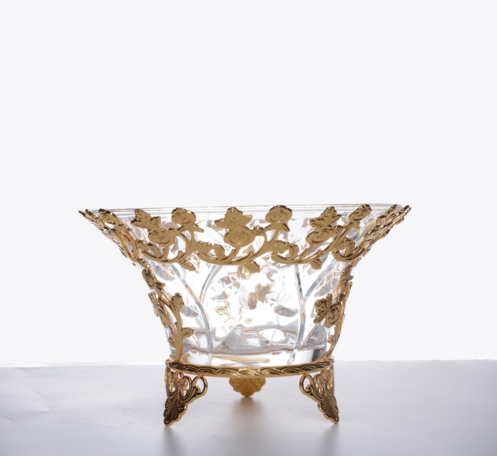 A candy dish with a gold base